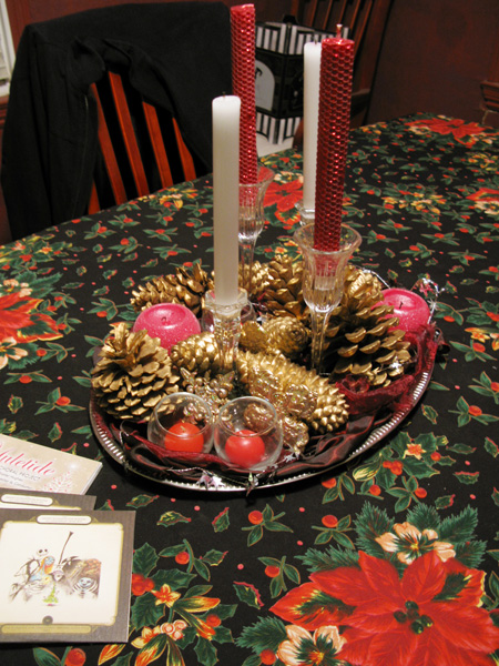 The tablecloth is black with poinsettias from April Cornell